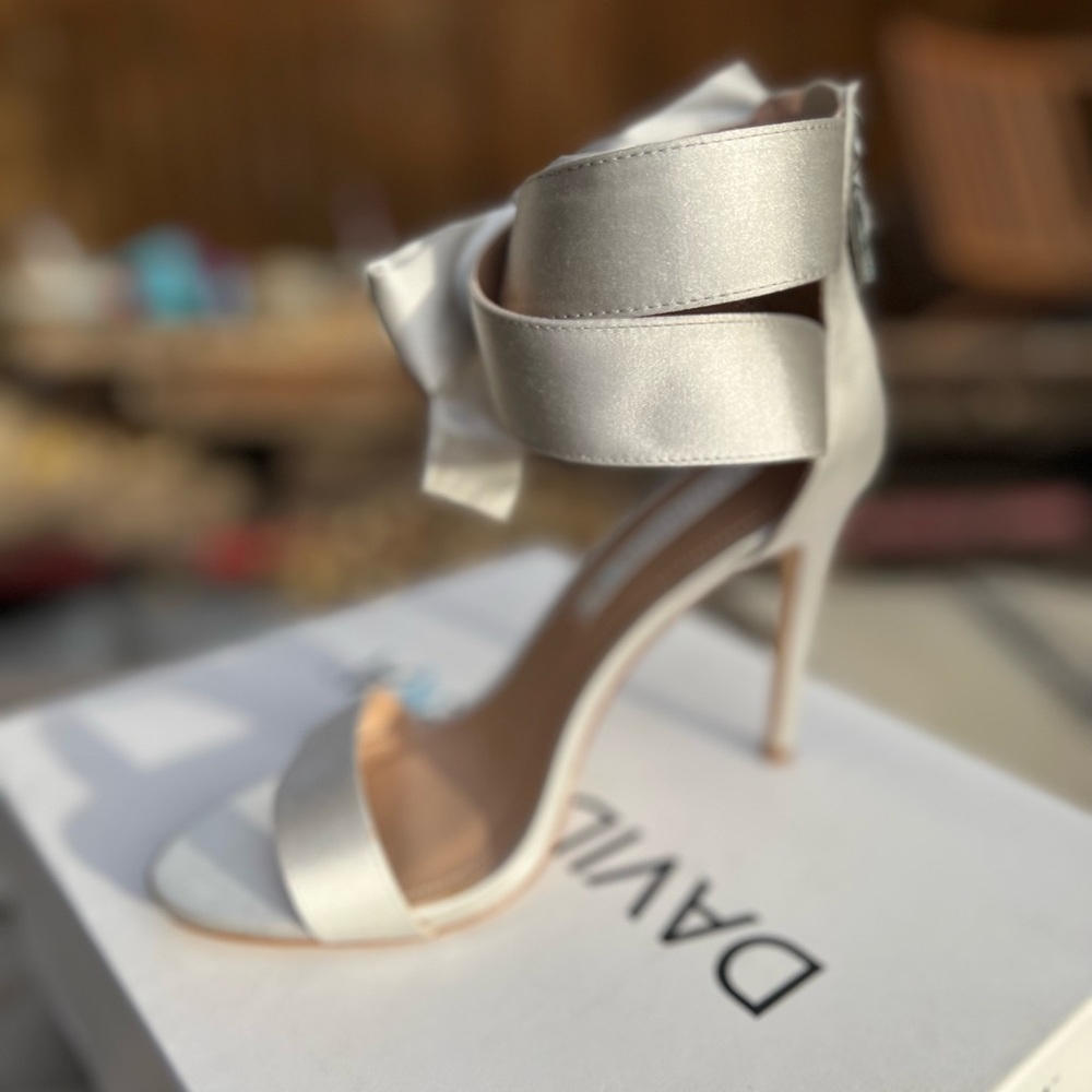 David tutera satin high heels with ankle bow. Silver and brand new with box.